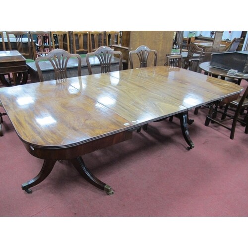 A George III Mahogany Twin Pedestal Dining Table, with reed...
