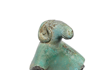 A Greek bronze vessel attachment with a ram's head