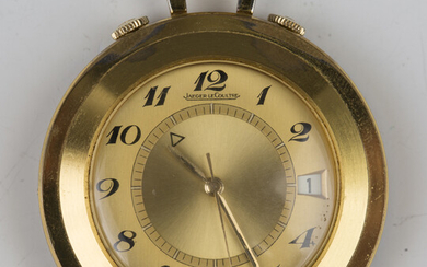 A Jaeger-LeCoultre Memovox alarm gilt metal circular cased lady's travelling watch, the signed