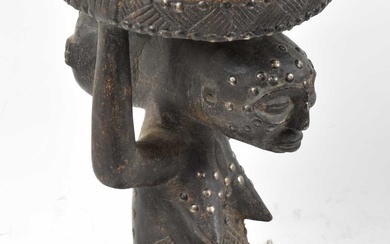 A Luba, Democratic Republic of Congo, stud decorated figural stool,...