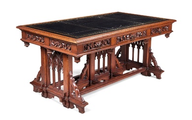 A MID VICTORIAN OAK LIBRARY TABLE IN THE GOTHIC TASTE, CIRCA 1860