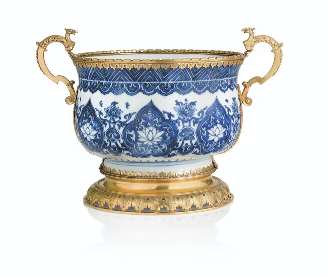 A NORTH EUROPEAN ORMOLU-MOUNTED CHINESE BLUE-AND-WHITE PORCELAIN CACHE-POT, THE PORCELAIN KANGXI (1662-1722), THE MOUNTS POSSIBLY EARLY 18TH CENTURY