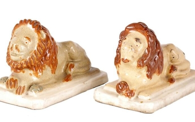 A PAIR OF 19TH CENTURY GLAZED PAINTED STONEWARE