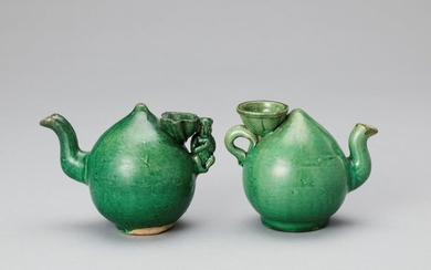 A PAIR OF EMERALD GREEN GLAZED POTTERY PEACH...