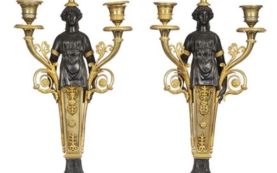 A PAIR OF PATINATED AND GILT BRONZE CANDLEABRA