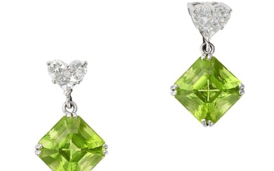 A PAIR OF PERIDOT AND DIAMOND DROP EARRINGS each set with a heart shaped cluster of half moon cut