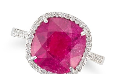 A PINK TOURMALINE AND DIAMOND RING set with a cushion cut pink tourmaline of 5.03 carats in a border