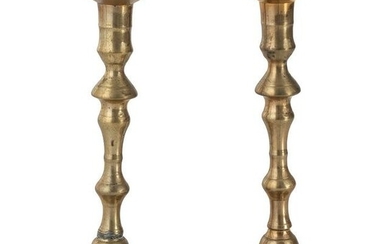 A Pair of English Brass Petal Base Candlesticks