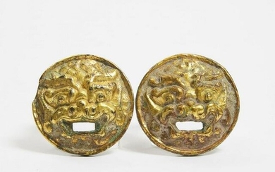 A Pair of Gilt Bronze 'Mythical Beast' Roundels, Tang