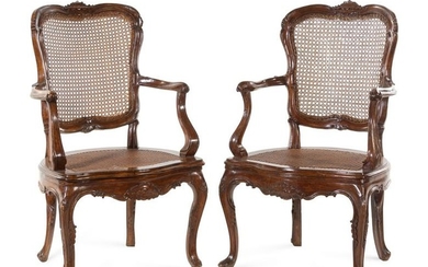 A Pair of Louis XV Style Walnut Fauteuils