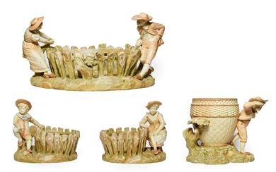 A Pair of Royal Worcester Porcelain Figural Baskets, 1888, modelled...