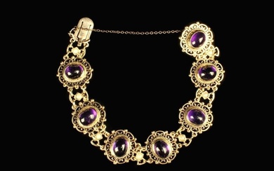 A Pretty 9 Carat Gold Bracelet set with amethyst cabochons and seed pearls. Approx. 20cm in length i