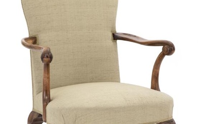 A Queen Anne style walnut armchair. England, c. 1900.
