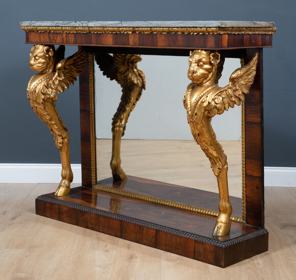 A Regency and later rosewood marble topped console table