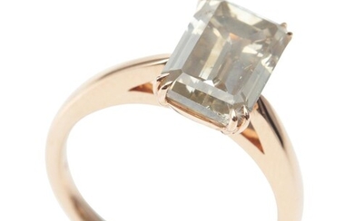A SOLITAIRE COGNAC DIAMOND RING BY CARTMER