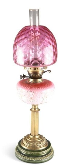 A VICTORIAN POTTERY AND BRASS OIL LAMP, with reeded