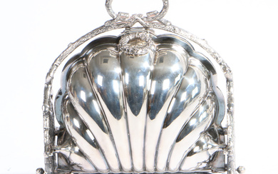 A VICTORIAN SILVER PLATED CLAM SHELL MUFFIN WARMER.