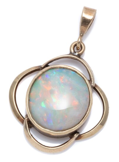 A VINTAGE 9CT GOLD OPAL PENDANT; rub set with a 12 x 11mm solid opal with good colour display in a quatrefoil shape frame, wt. 2.3g.