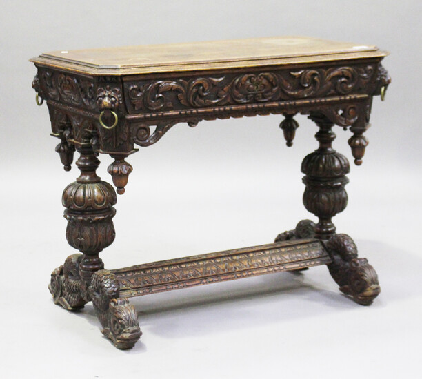A Victorian Baroque Revival carved oak centre table, fitted with a single frieze drawer, raised on c