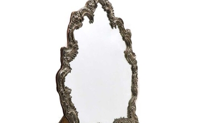 A Victorian silver dressing table mirror by William Comyns