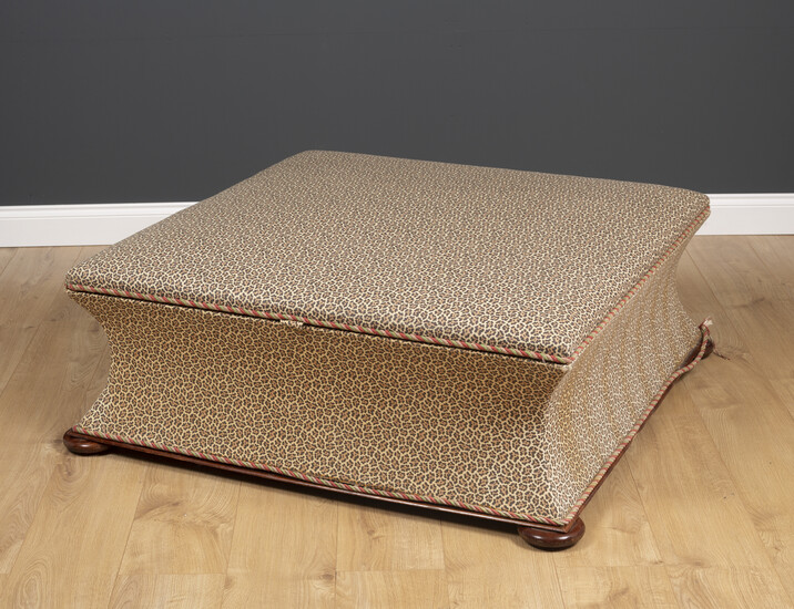 A Victorian style square ottoman stool