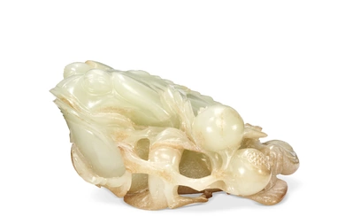 A WHITE AND RUSSET JADE FIGURE OF A THREE-LEGGED TOAD CHINA, QING DYNASTY (1644-1911)