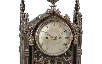 A WILLIAM IV/EARLY VICTORIAN PATINATED BRONZE GOTHIC REVIVAL BRACKET CLOCK