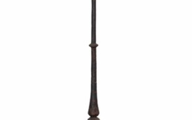 A WROUGHT IRON CANDLESTAND