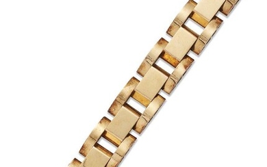 A broad bracelet, of large rectangular and domed articulated link design, length 18.5cm