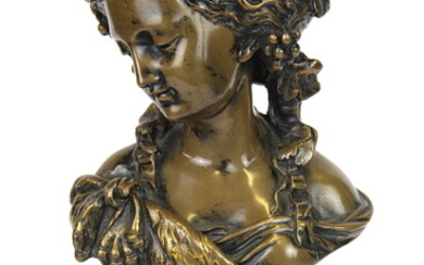 A bronze bust of a lady on a hardstone pedestal, H. 21cm.