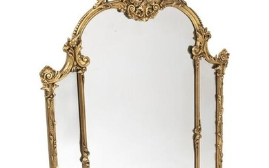 A carved wood, gesso, and gilt wall mirror