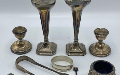 A collection of sterling silver items to include a...