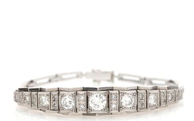 A diamond bracelet set with numerous brilliant- and single-cut diamonds totalling app....