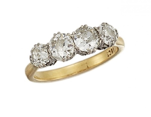 A diamond four stone ring, of half-hoop...