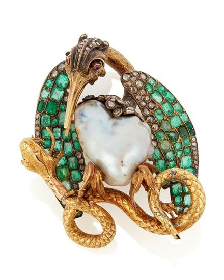 A gem-set bird and serpent brooch