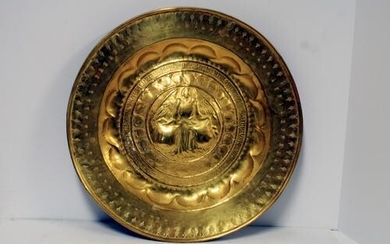A large early 16th century Alms dish with a central