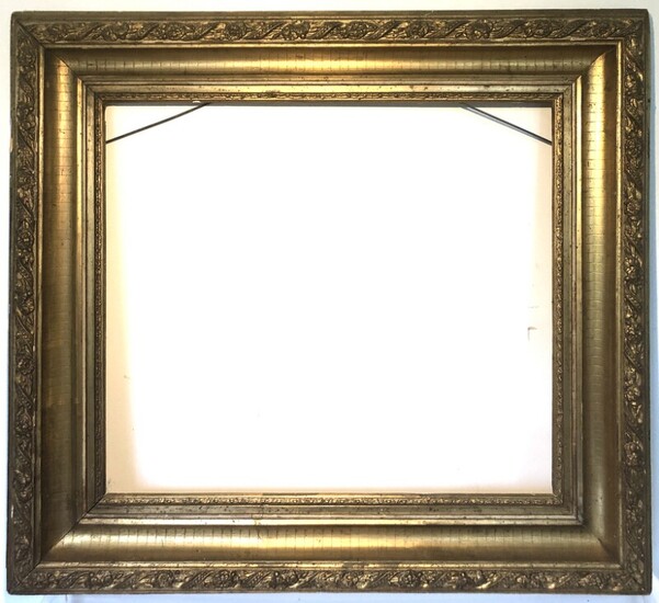 A late 19th century giltwood frame. Visible size 59×66 cm. Frame size 81×88 cm.