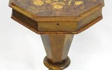 A late 19thC trumpet shaped sewing table with floral