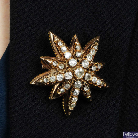 A late Victorian 9ct old old and rose-cut diamond star brooch.