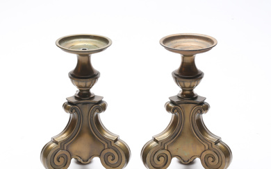 A pair of 20th century baroque candlesticks.
