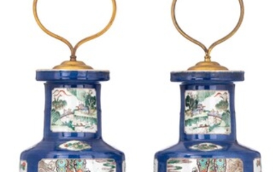 A pair of Chinese bleu poudré ground and famille verte rouleau vases, with a Qianlong mark, 19thC, H 60 cm