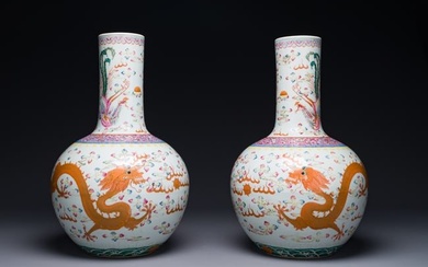 A pair of Chinese famille rose 'dragon' bottle vases, Tongzhi/Guangxu
