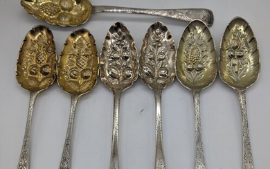 A pair of George III silver berry spoons, hallmarked...