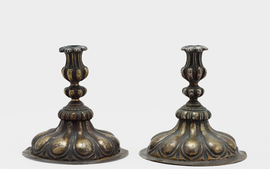 A pair of Italian Baroque candlesticks, 16th/18th century.