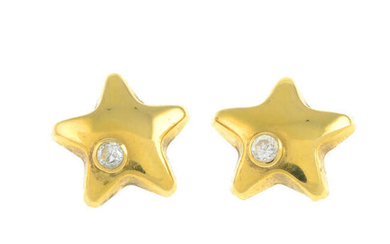 A pair of cubic zirconia star stud earrings.