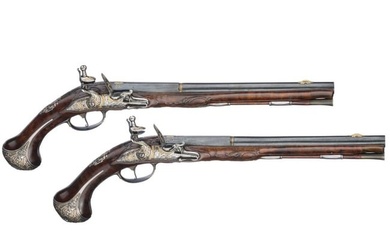 A pair of deluxe silver-mounted flintlock pistols by Johann Hatischweiler of Karlovy Vary, circa