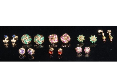 A pair of emerald knot ear studs, stamped '9K' for 9ct gold;...