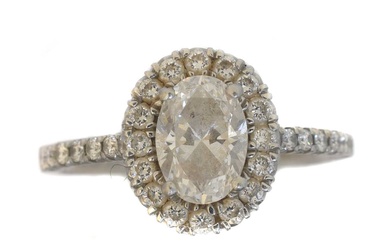 A platinum diamond halo cluster ring.