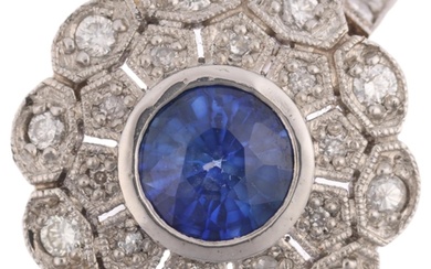 A platinum sapphire and diamond flowerhead cluster ring, mak...