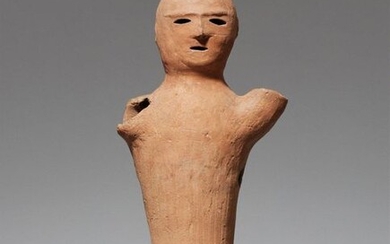 A reddish clay haniwa figure. Kofun period, 6th/7th century